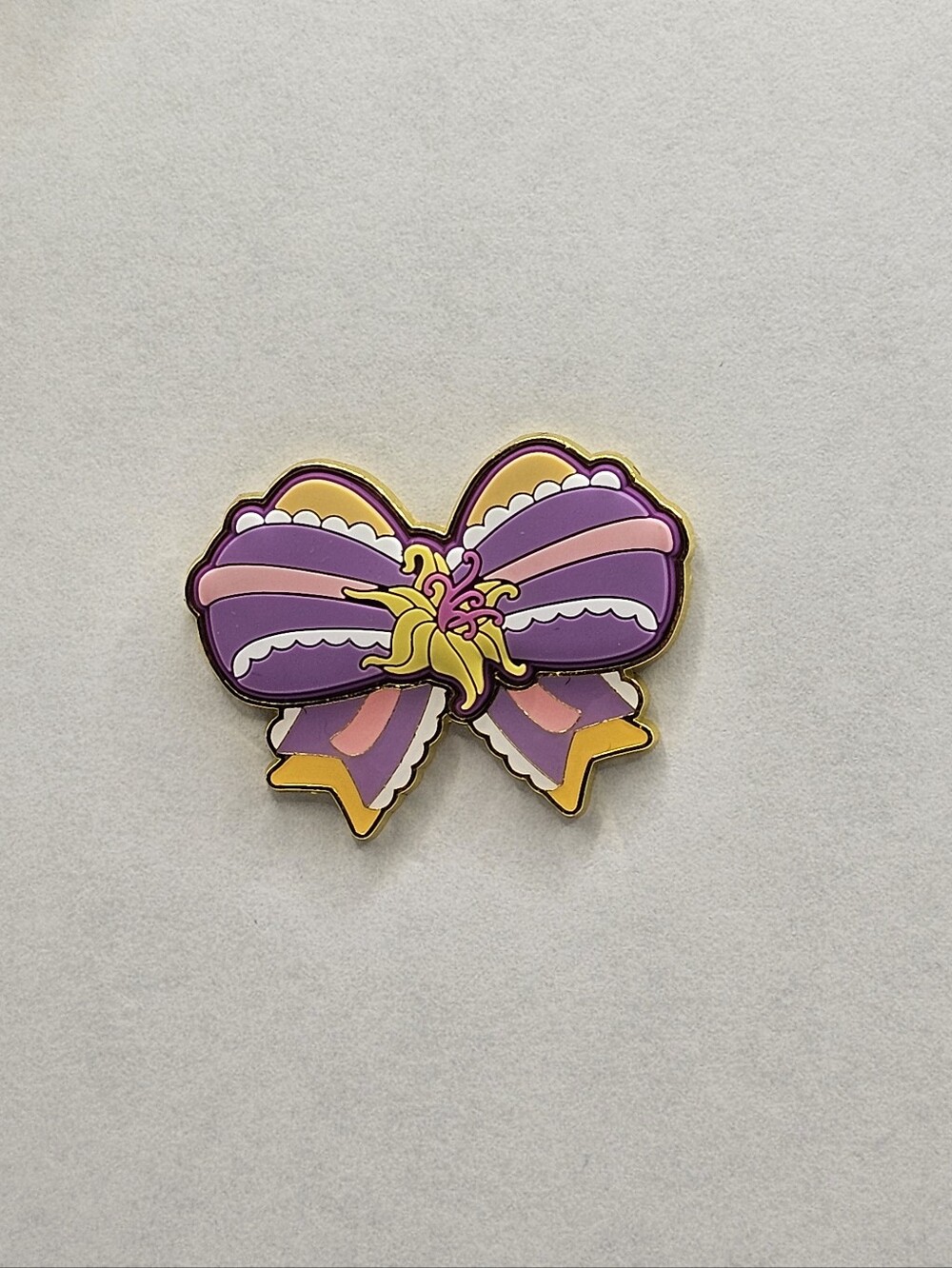Disney Loungefly PVC Princess Bows Pin 2025 Series featuring Rapunzel Colors
